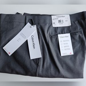 Calvin Klein Chinos, Brand NEW with tags.JEROME GREY